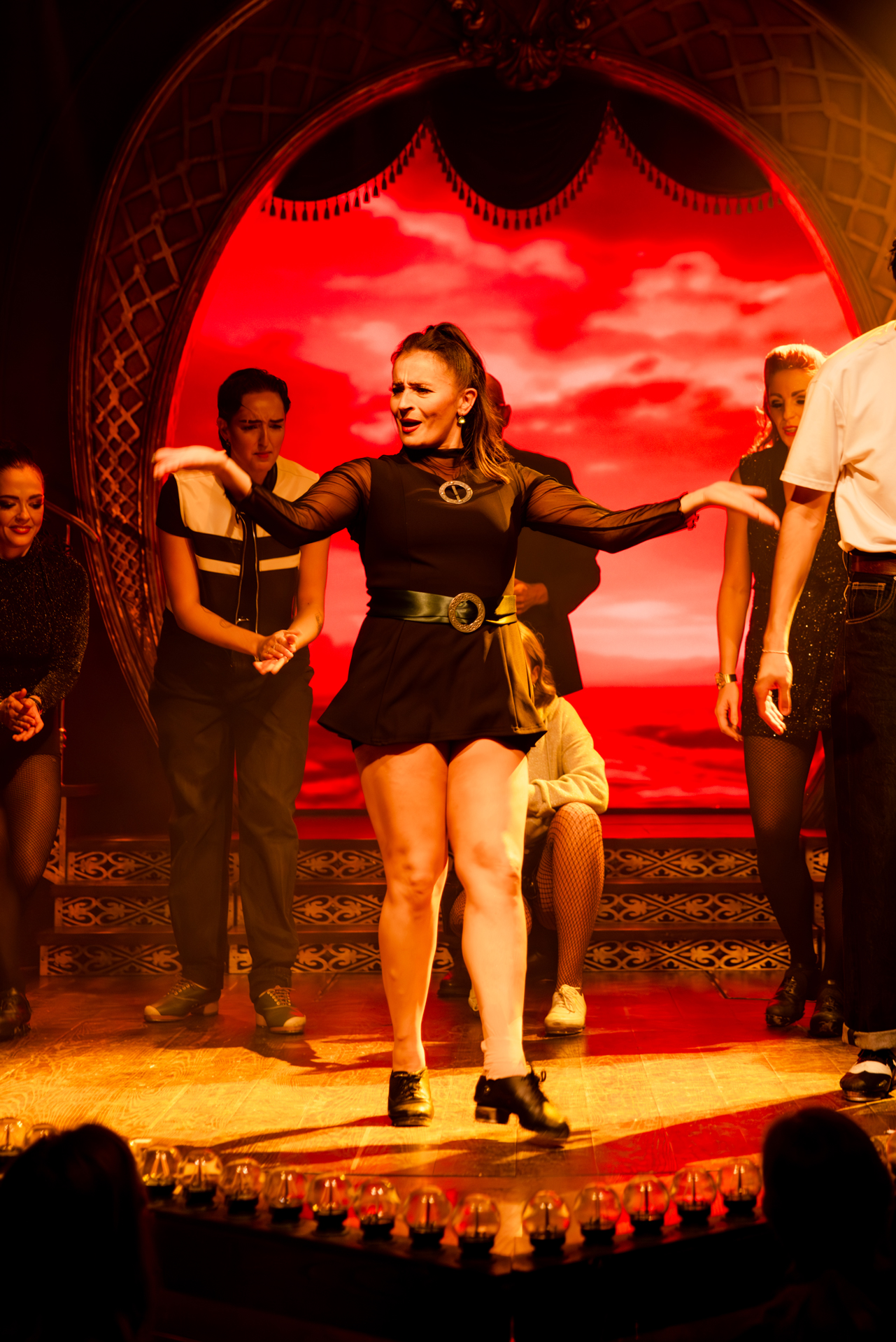 A number of dancers on stage as part of the show Adam Garcia's Emerald Storm