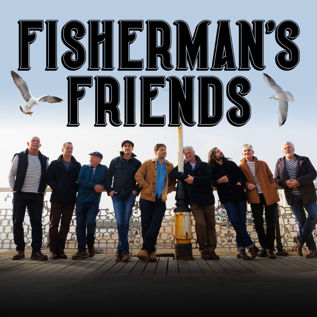Promotional banner for the theatre show Fisherman's Friends appearing at the Victoria Theatre Halifax.  The image features a group of 8 men, singers from the band standing at the seaside.
