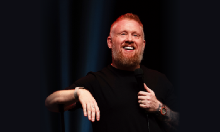 Comedian Paul Smith on a black background ahead of his show at the Victoria Theatre Halifax